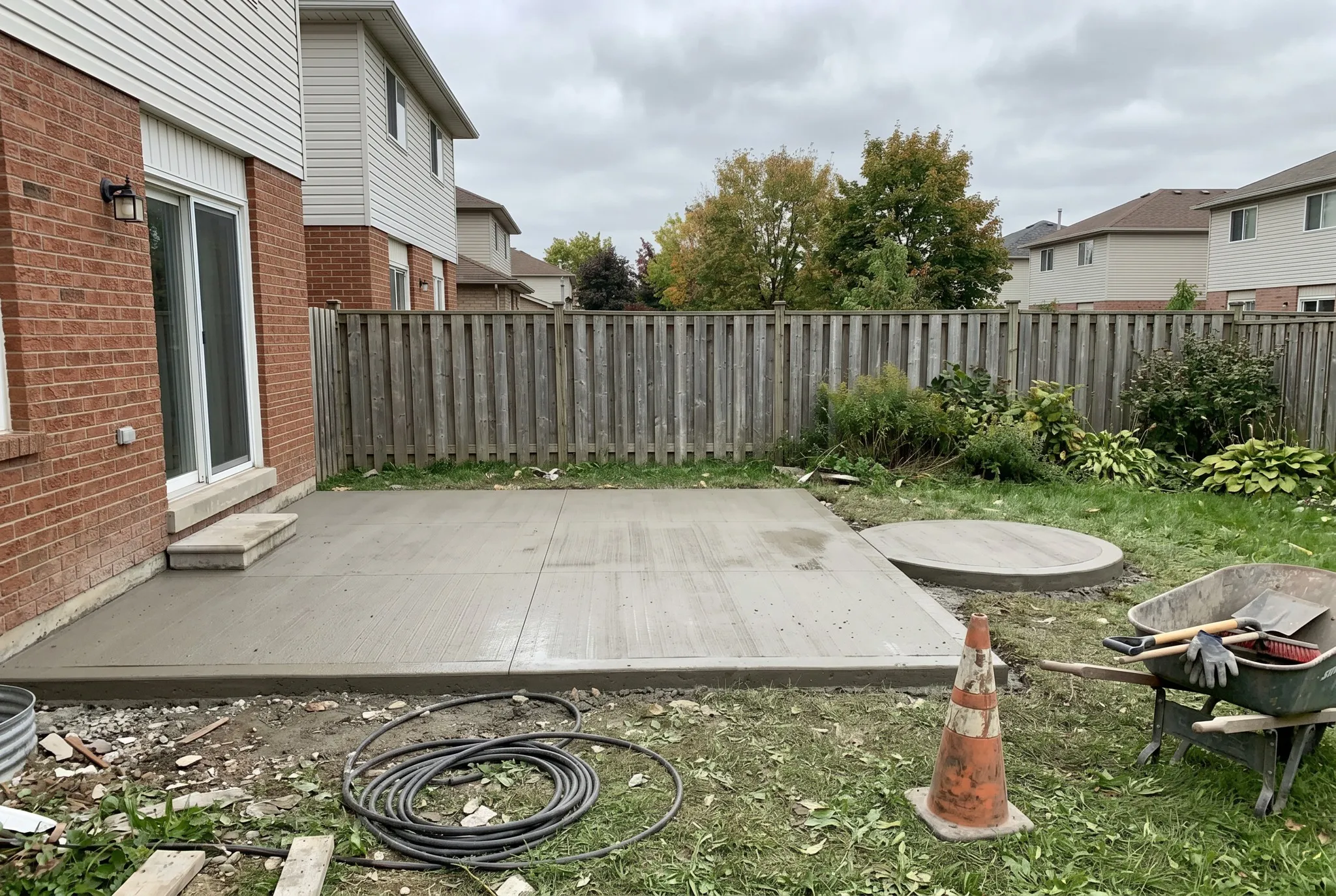 A backyard concrete patio, Southern Ontario
